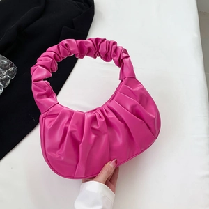Chic hot pink ruched crescent handbag with pleated faux leather texture for women