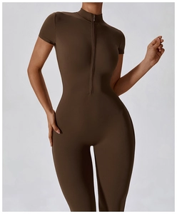 Close-up of the front zipper and stand collar on this coffee short sleeve yoga bodysuit