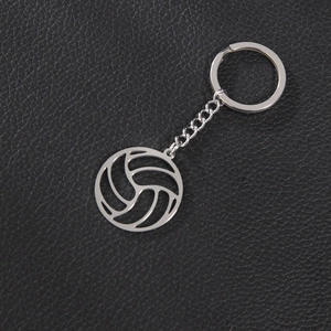 Polished stainless steel volleyball pendant keychain with hollow design on black leather