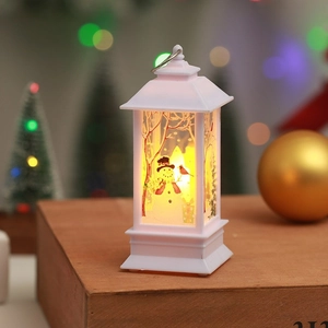 Close-up of white Christmas LED lantern with snowman print on a festive wooden surface