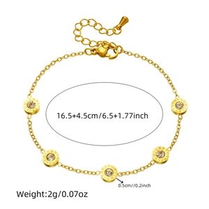 Gold stainless steel bracelet with rhinestone roman numeral charms on white background
