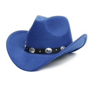 Close-up of royal blue western cowboy hat with silver rivets and vintage metal studs