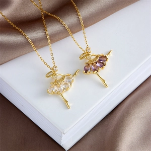 Elegant gold ballerina dancer necklace with white and purple zircon stones on silk