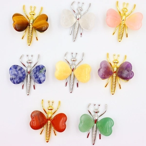 Set of eight natural crystal butterfly crafts featuring multi-color stones and metal bodies