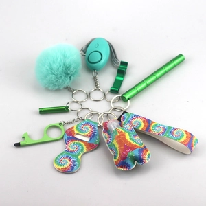 Detailed top view of tie-dye green safety keychain set with alarm and fluffy pompom