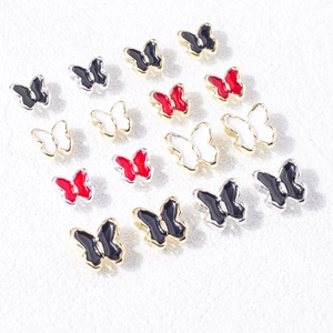 Détails de charmes pour ongles papillon 3D en résine colorée avec bords dorés et argentés