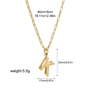 Detailed size specifications for gold letter K pendant on a paperclip chain necklace