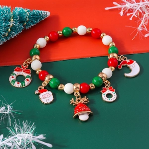 Close-up of Christmas beaded bracelet with festive Santa and snowflake alloy charms
