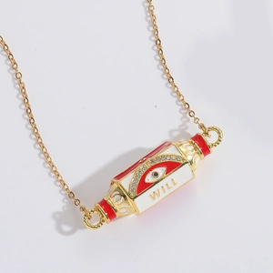 Detailed view of gold enamel cylinder pendant featuring diamond evil eye and WILL text