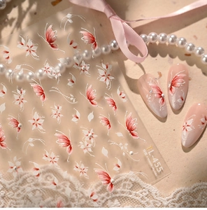 Macro view of TL-455 floral nail stickers with pink butterfly and white cherry blossoms