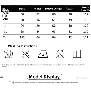 Tableau détaillé des tailles pour la robe noire à double boutonnage avec symboles de lavage