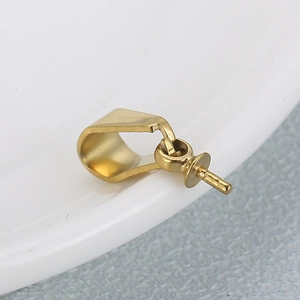 Close-up of 18K gold plated stainless steel pinch bails for necklaces on a white plate