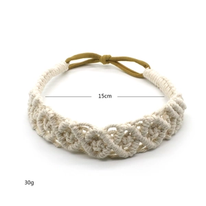 Close-up of beige handmade bohemian woven cotton headband with elastic band and 15cm diameter