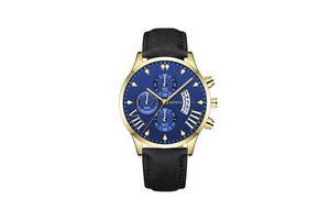 Macro shot of blue watch dial with calendar display and golden metal casing detail