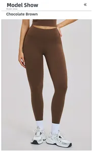 Detail view of high waisted chocolate brown yoga leggings with slim fit athletic fabric