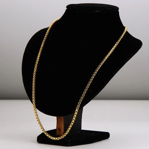Minimalist golden box chain necklace displayed on a black neck mannequin torso