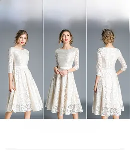 Detailed views of ivory white lace dress featuring high waist and A-line silhouette