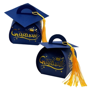 Dark blue graduation cap favor boxes with yellow tassels and gold FOR THE Graduate print