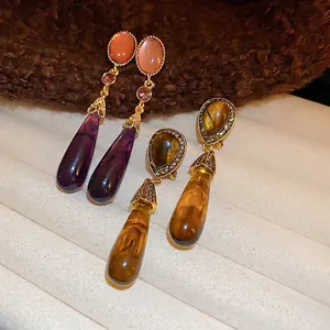 Vintage water drop earrings with silver needle, resin dangles and sparkling diamond accents