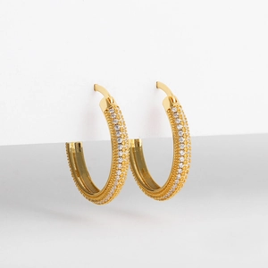 Close-up of 18K gold-plated hoop earrings with micro-pave white zircon stones