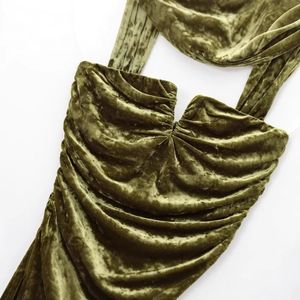 Olive green velvet strapless dress featuring elegant pleated texture on a white background