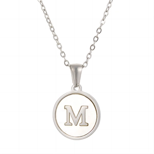 Silver stainless steel necklace with round white shell pendant featuring a letter M