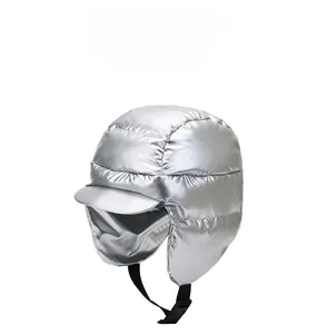 Detail of silver metallic quilted thermal winter trapper hat with adjustable buckle strap