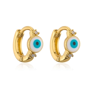 Detail of 18K gold evil eye huggie earrings with enamel finish and zircon accents