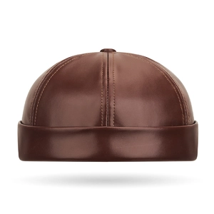 Brown PU leather Miki hat with vintage stitched segments and upturned brim on white background
