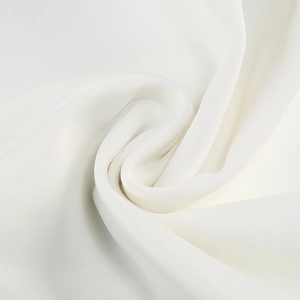 Detailed macro view of white mesh fabric texture and soft pleated polyester material