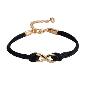 Minimalist black braided cord bracelet with golden infinity symbol and adjustable chain