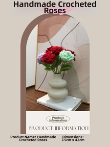 Detailed view of hand-crocheted roses in a vase with 42cm stems and 7.5cm flower heads
