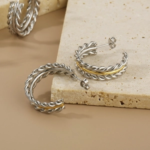 Two-tone twisted rope C-shaped stainless steel hoop earrings on stone base