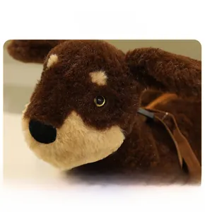Close-up of the soft plush fabric and detailed stitching on the dachshund puppy toy bag