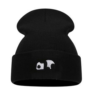 Detailed view of the cute panda embroidery on the black ribbed knit beanie cuff