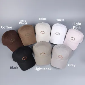 Detailed embroidery of COMFORT ZONES on cotton twill baseball caps in eight colors