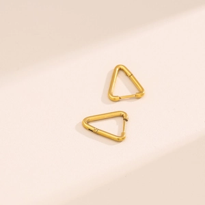Detailed macro view of 18K gold plated triangle hoop earrings with secure clasp design