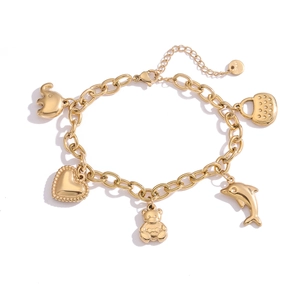 Detail of 18K gold-plated stainless steel charm bracelet with heart and animal pendants