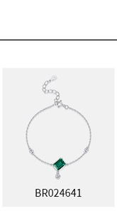 Detail view of S925 sterling silver chain with emerald-cut green gemstone and extension