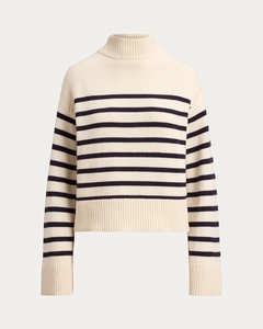 Detailed close-up of striped high-neck knit sweater featuring premium texture and loose fit