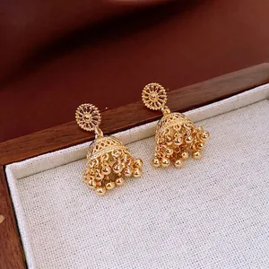 14K gold plated bell-shaped tassel earrings with ethnic hollow design in jewelry box