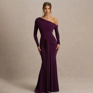 Detail view of the elegant fuchsia one-shoulder evening gown with draped ribbon and ruching