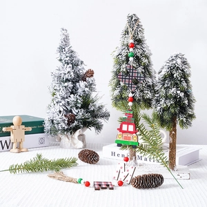 Close-up of Christmas wooden bead garland with letters and red truck pendant decor