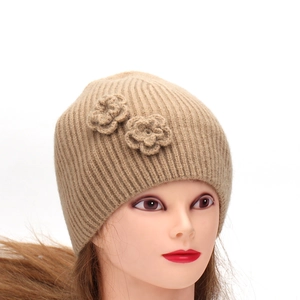 Sweet beige knit beanie for women with elegant crochet flower accents for winter warmth