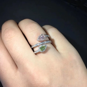 Double layer open ring with pear shaped pink and yellow-green stones and tiny diamonds