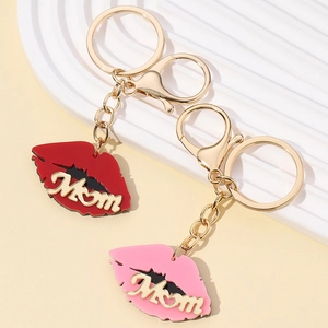 Red and pink lip-shaped keychains with golden Mom lettering and swivel lobster clasps