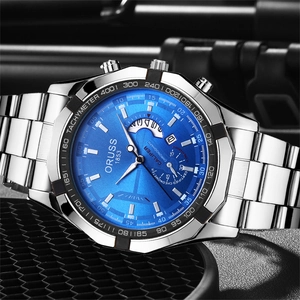 Macro shot of ORUSS silver stainless steel watch with blue sunray dial and tachymeter