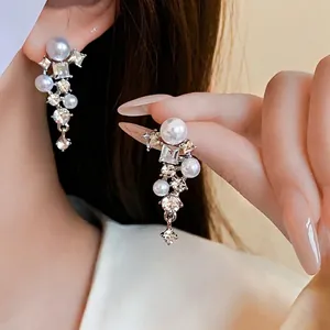 Silver needle leaf earrings with cascading pearls and rhinestones for elegant women