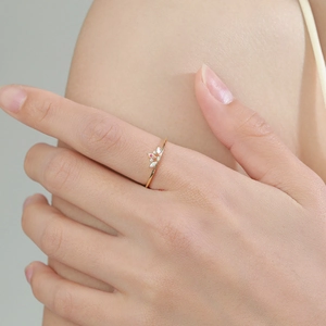 Elegant 925 sterling silver crown ring with colorful gemstones on a female model finger