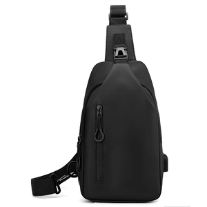 Waterproof black crossbody chest bag for men with adjustable strap and USB charging port